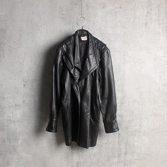 vtg angle leather coat